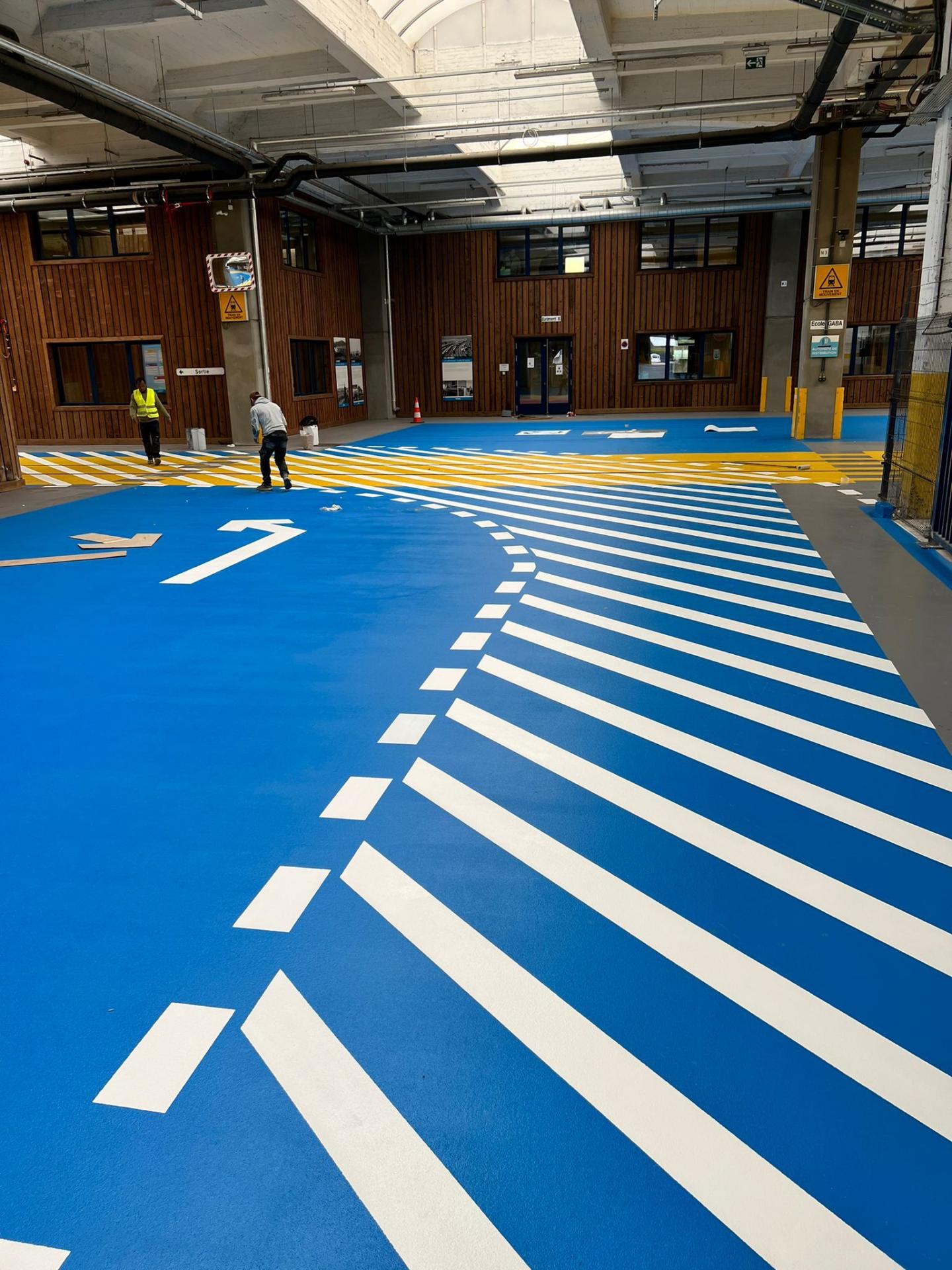 Epoxyinstrooivloer werkplaats Flawinne